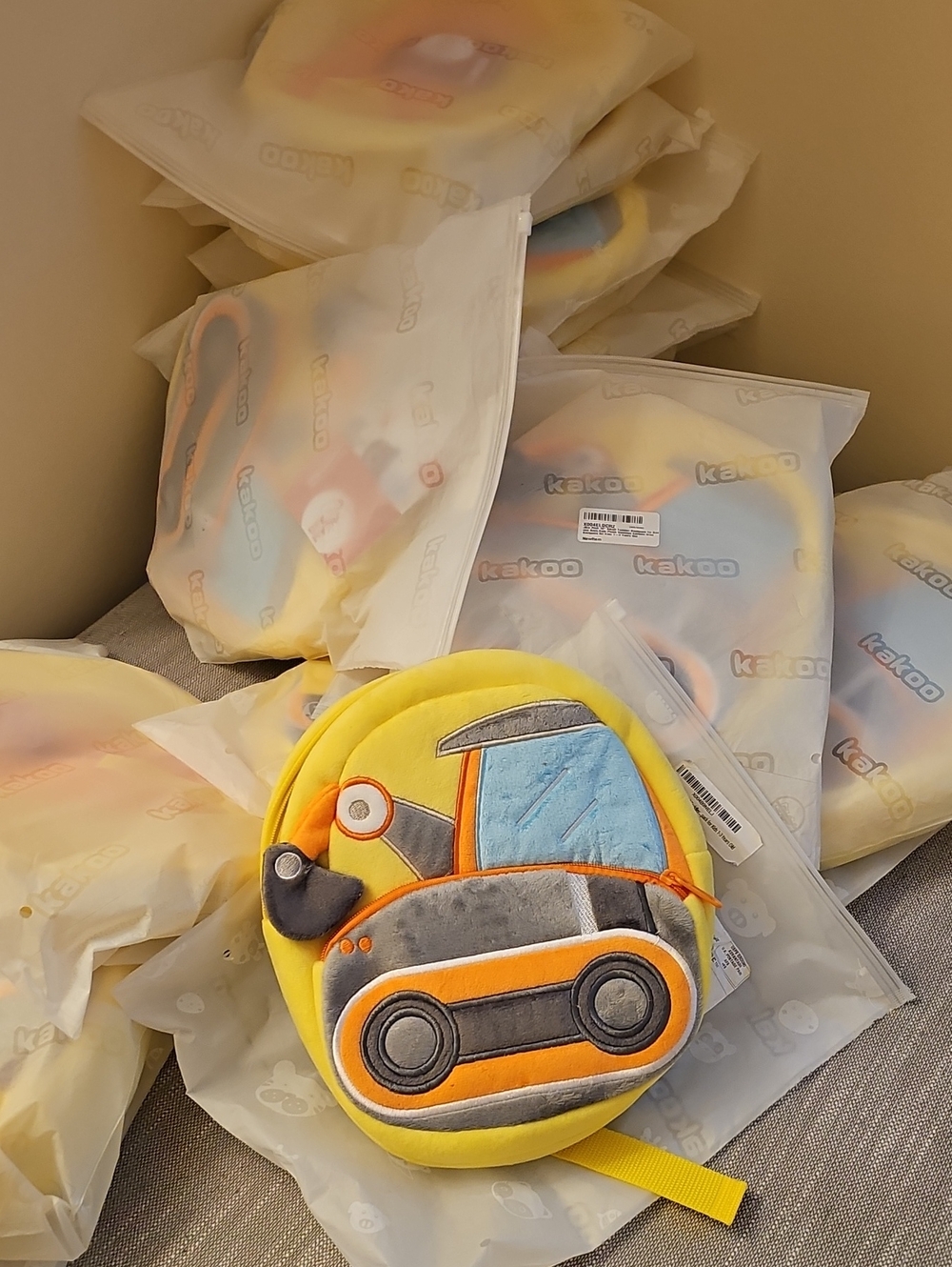 Akoo Yellow and Orange Construction Truck Plush Backpack
